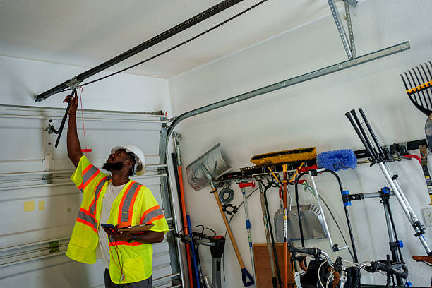 Professional Garage Door Panel Replacement technician working in Benwood, WV